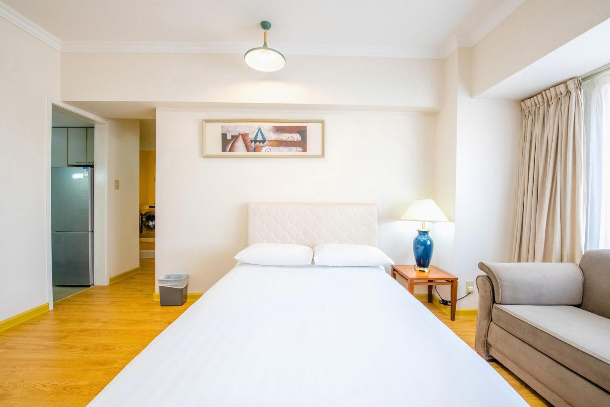Ruishi Hotel Далиен Екстериор снимка