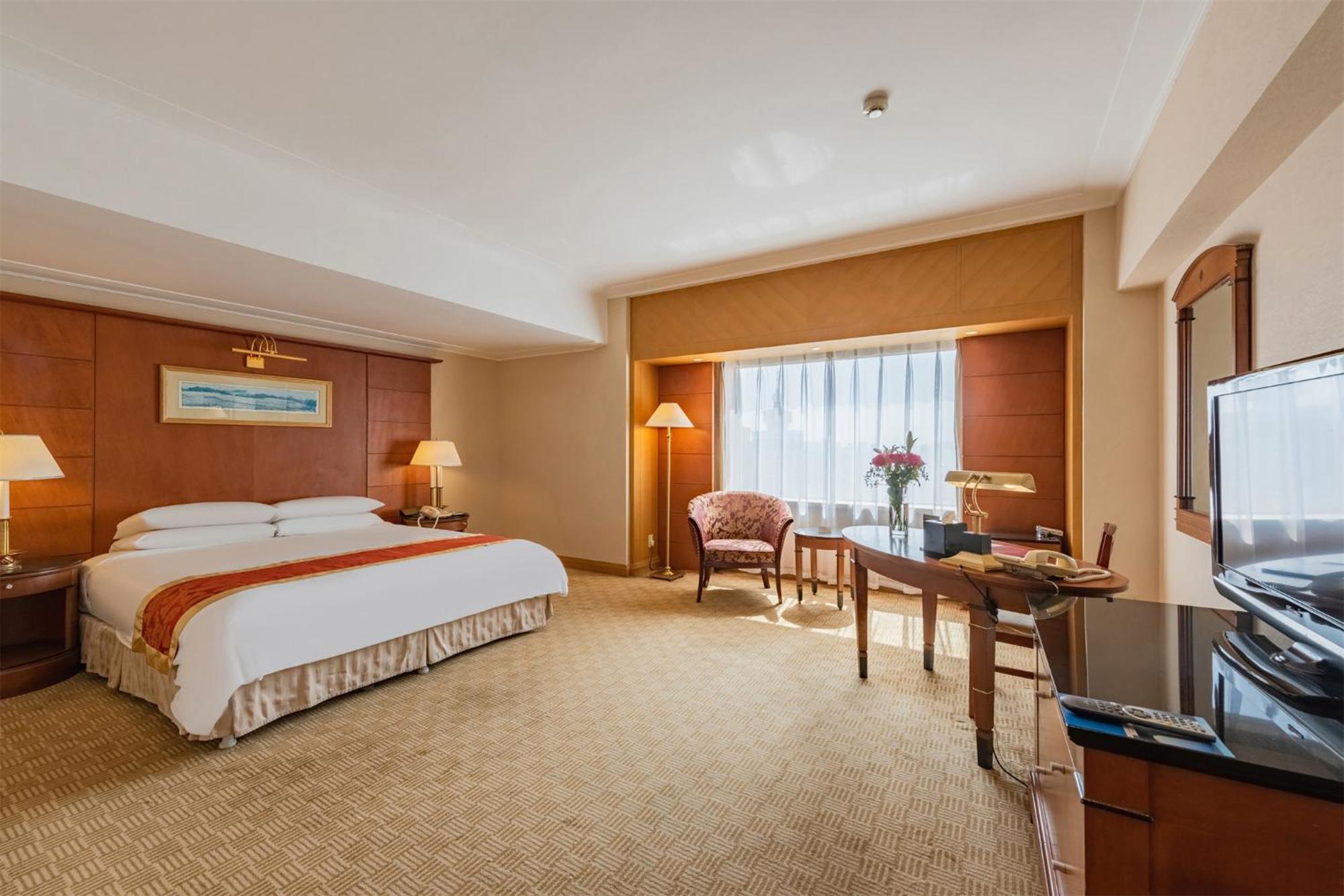 Ruishi Hotel Далиен Екстериор снимка