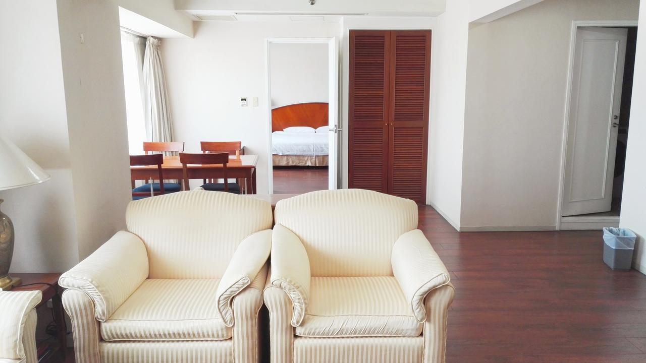 Ruishi Hotel Далиен Екстериор снимка