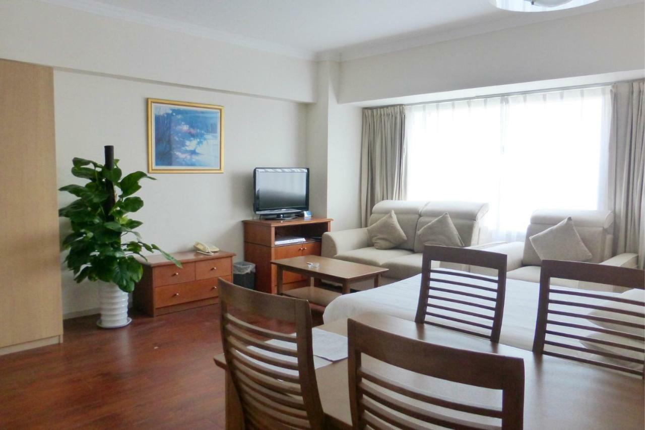 Ruishi Hotel Далиен Екстериор снимка